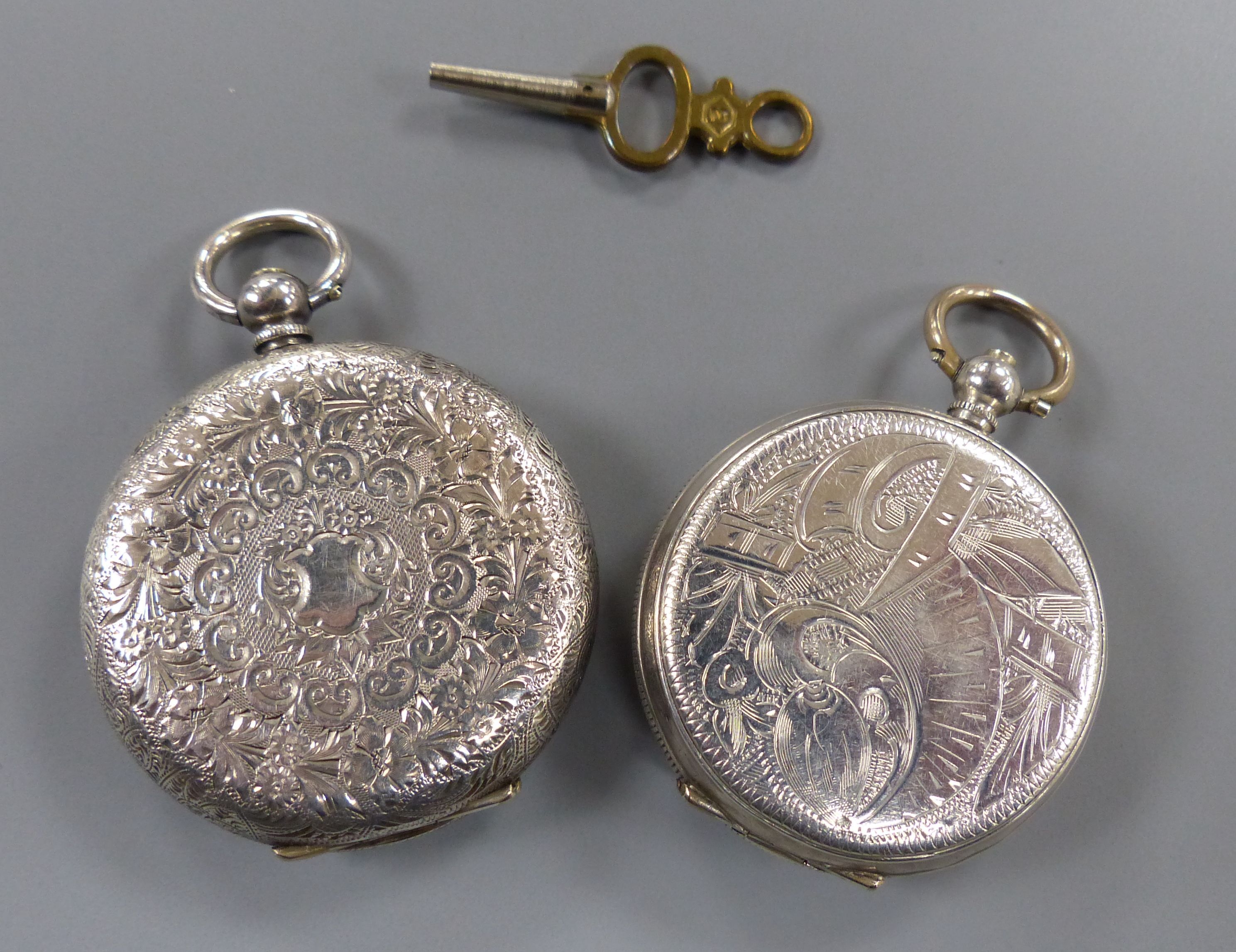 Two engraved silver open face pocket watches,